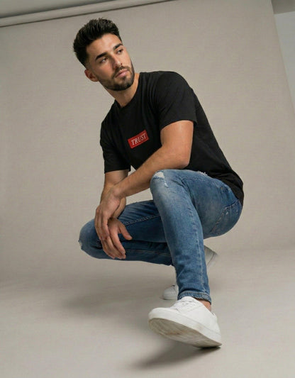 Trust Unisex Stretch T-shirt.